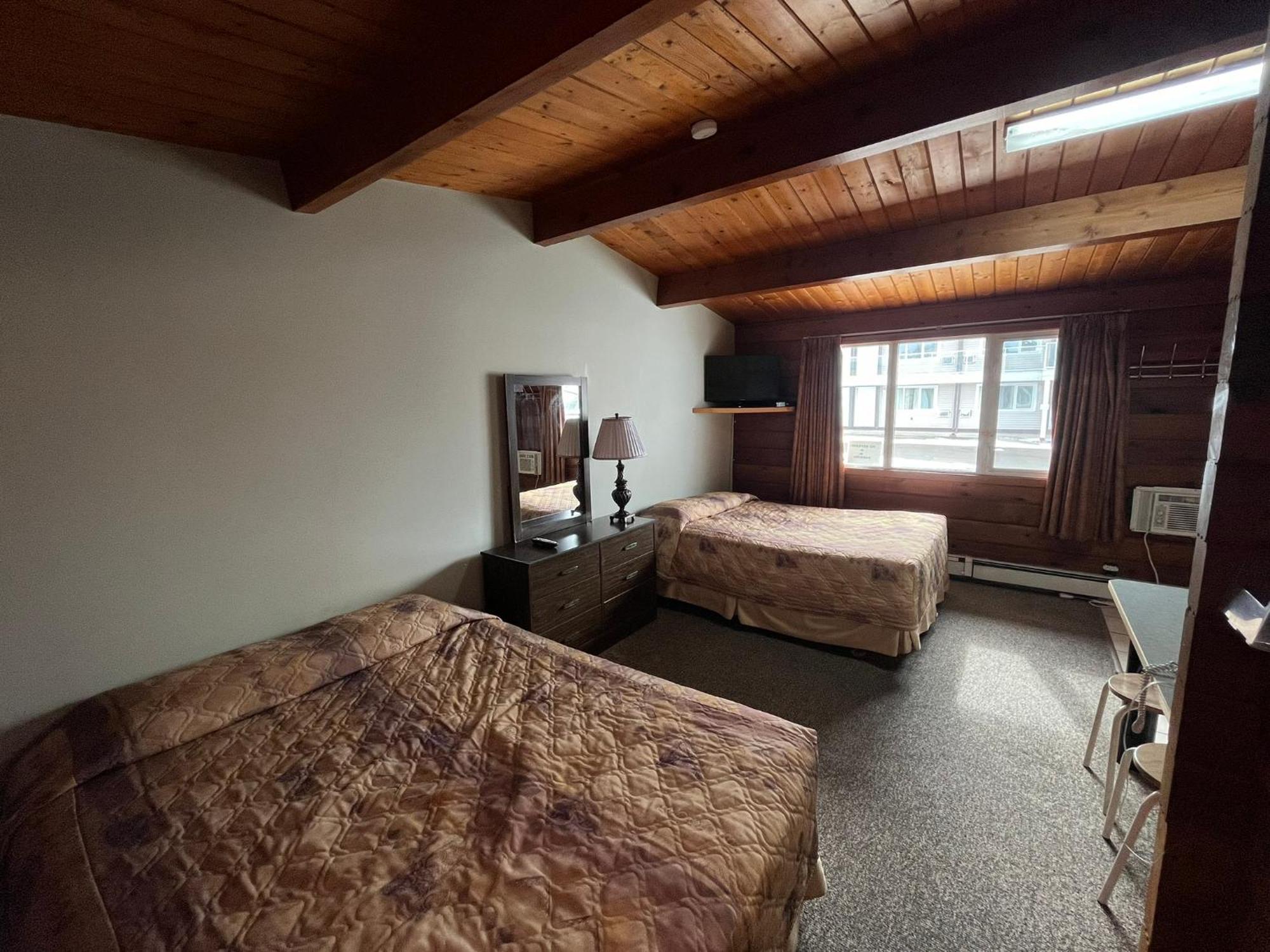 Raccoon Lodge Motel Sylvan Lake Exterior foto