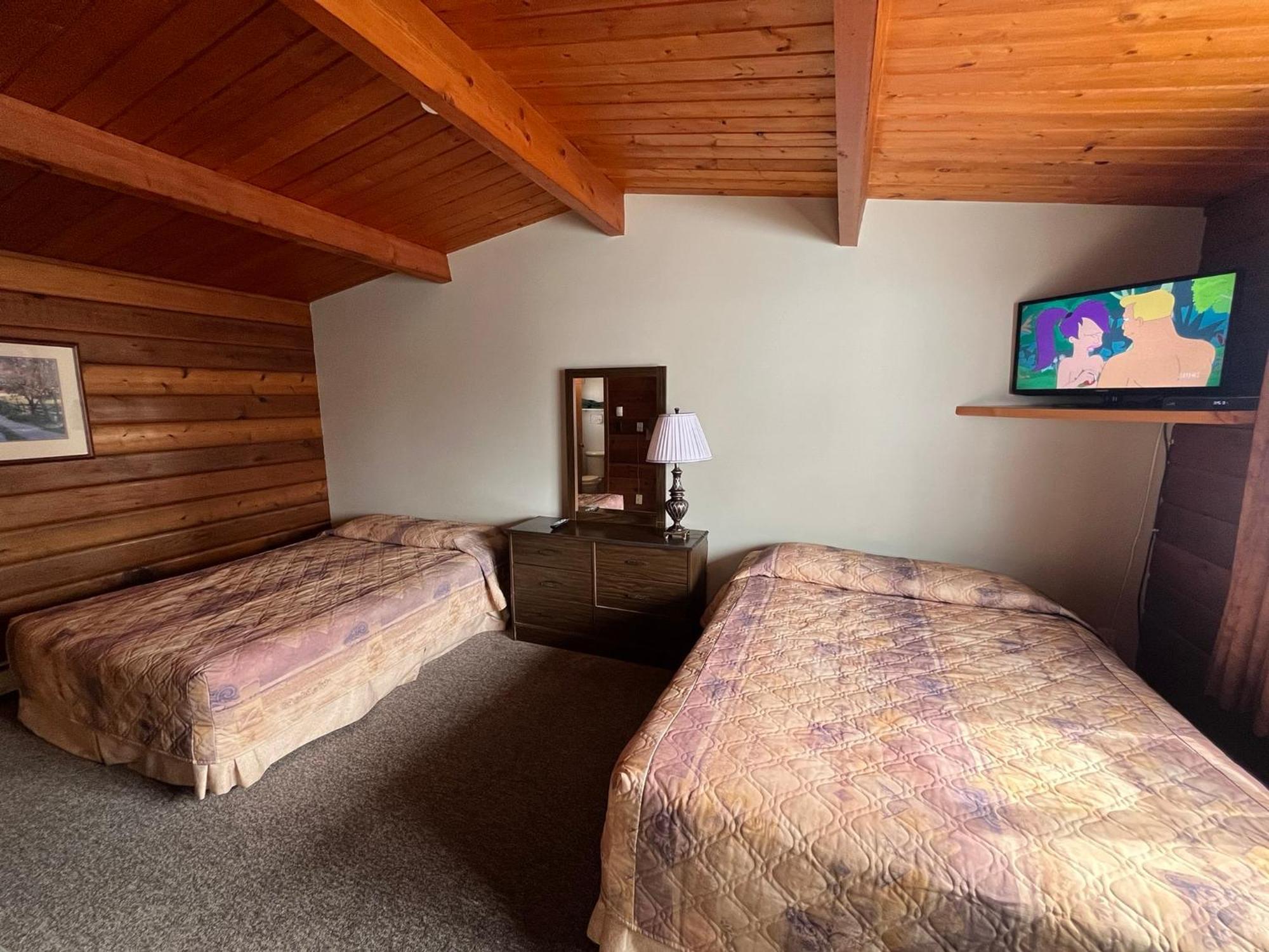 Raccoon Lodge Motel Sylvan Lake Exterior foto